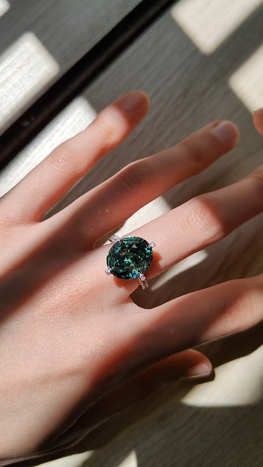Oval luxurious dark green diamond ring